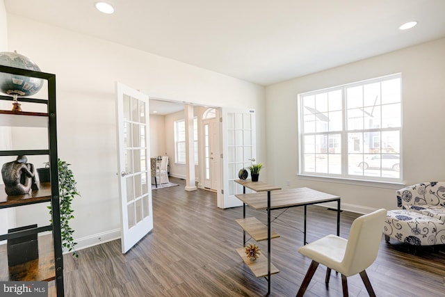 sitting room with french doors and hardwood / wood-style floors