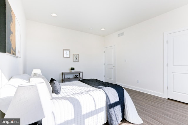 bedroom featuring hardwood / wood-style flooring