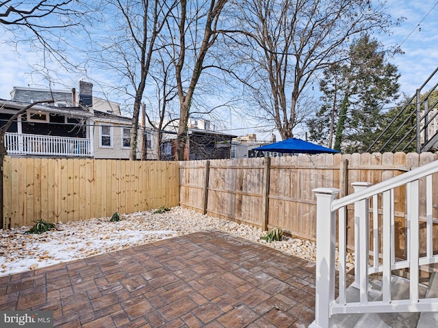 view of snow covered patio