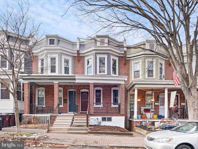 multi unit property featuring covered porch