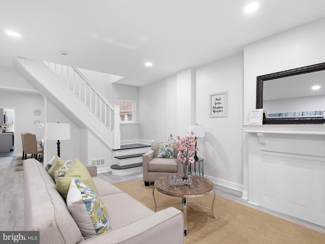 living room featuring light hardwood / wood-style floors