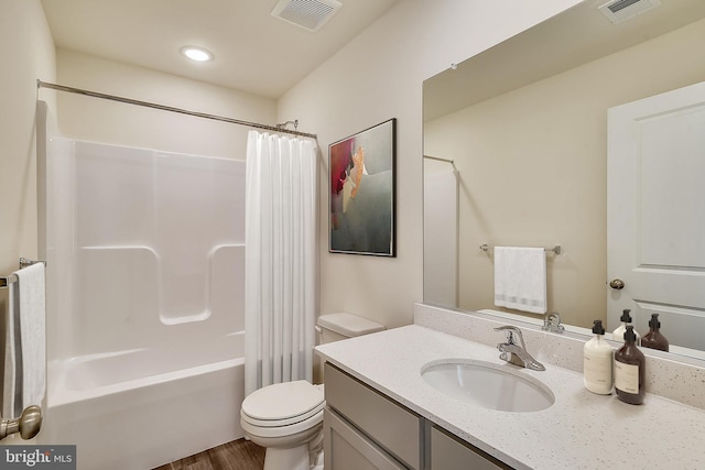 full bathroom with vanity, toilet, wood-type flooring, and shower / bathtub combination with curtain