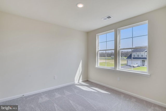 view of carpeted spare room