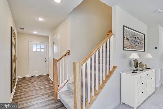 entrance foyer with light hardwood / wood-style flooring