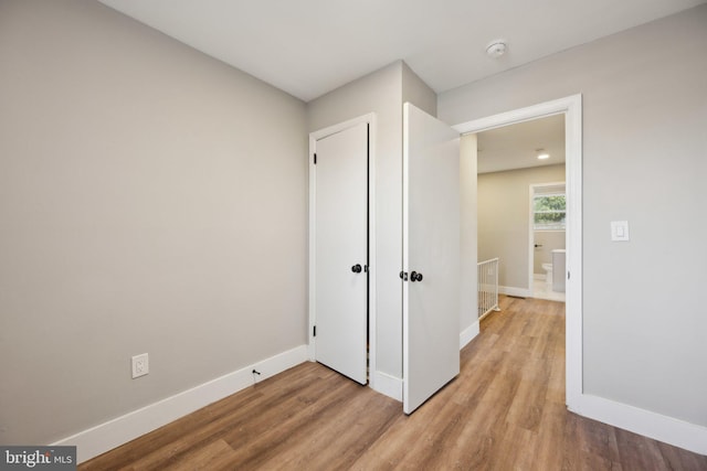 unfurnished bedroom with light hardwood / wood-style flooring