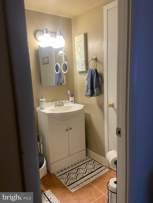 bathroom with vanity and tile patterned floors