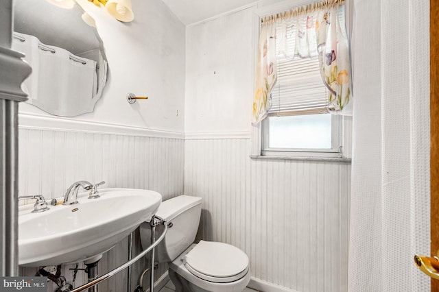 bathroom with sink and toilet