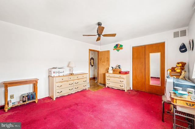 carpeted bedroom with ceiling fan