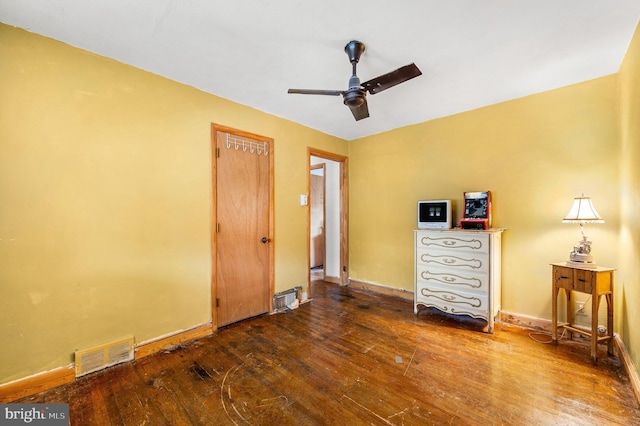 unfurnished bedroom with hardwood / wood-style flooring and ceiling fan