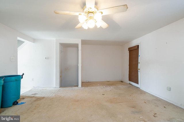 spare room featuring ceiling fan and lofted ceiling