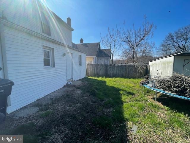 view of yard with a trampoline