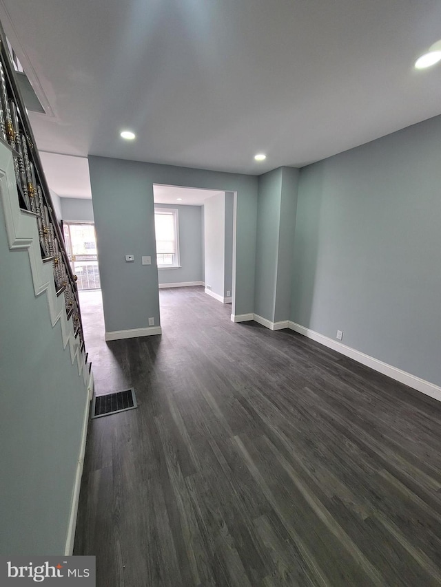 interior space with dark hardwood / wood-style floors