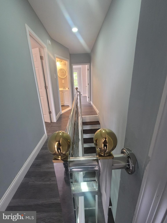 hallway featuring dark hardwood / wood-style floors