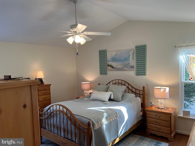 bedroom featuring ceiling fan, vaulted ceiling, and hardwood / wood-style flooring