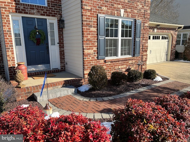 entrance to property featuring a garage