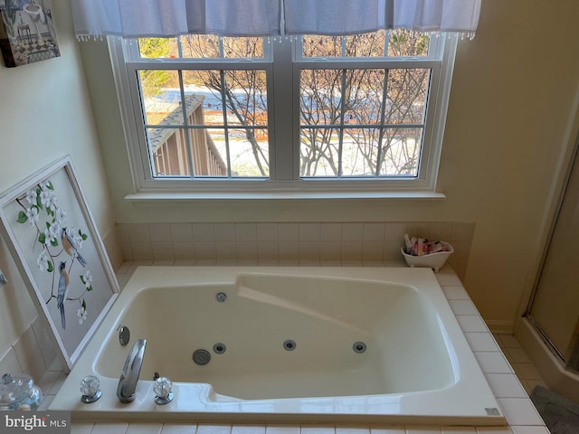 bathroom with tiled tub