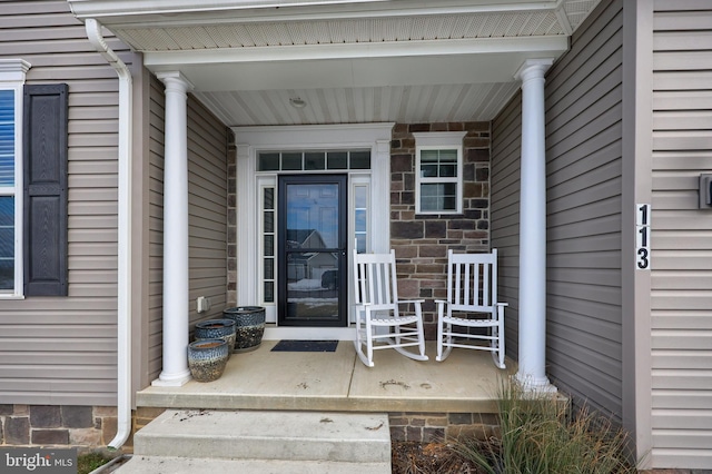 entrance to property with a porch