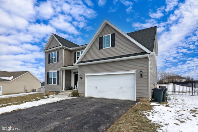 view of front of property with a garage