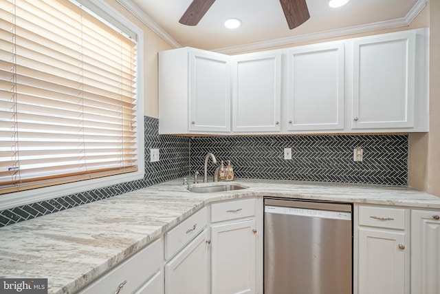 kitchen featuring sink, white cabinets, and dishwasher