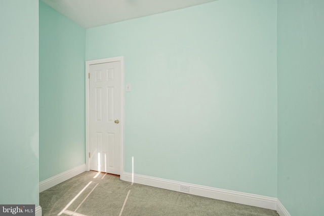 empty room featuring carpet floors