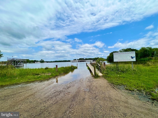 property view of water featuring a dock