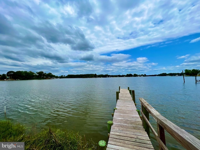 view of dock with a water view