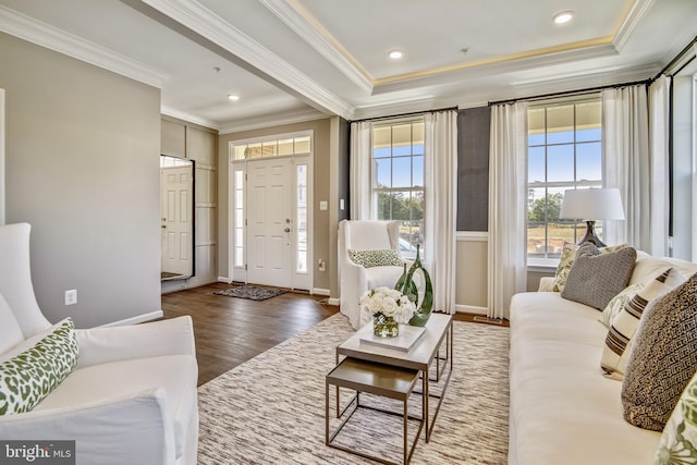 living room with ornamental molding and dark wood-type flooring