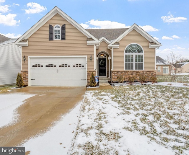 view of front of property with a garage