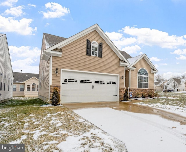 view of front of property with a garage