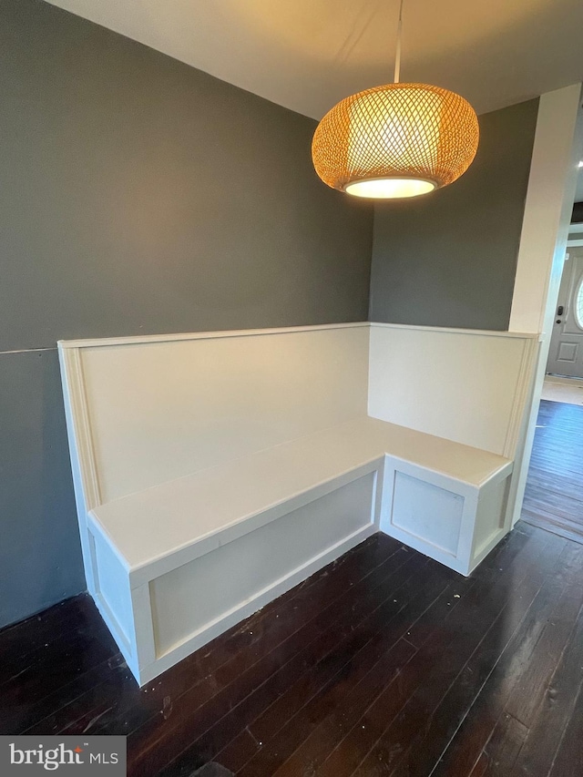 mudroom featuring dark wood-type flooring