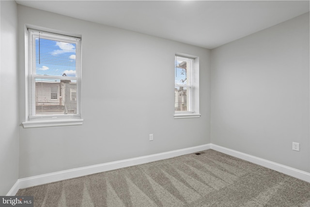 view of carpeted spare room