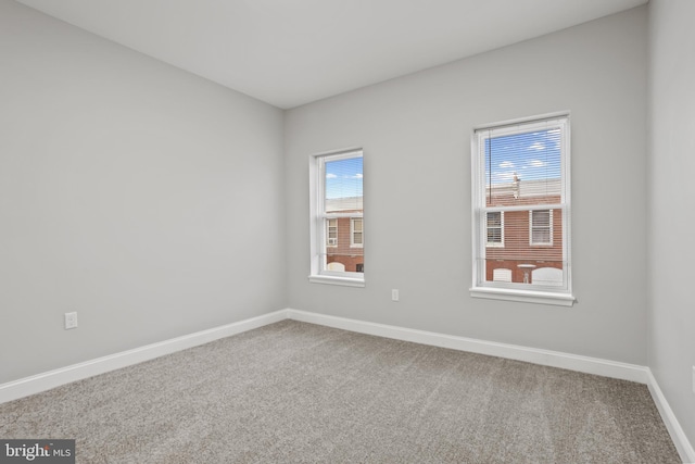 spare room with carpet floors