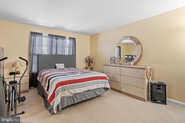 bedroom with light colored carpet