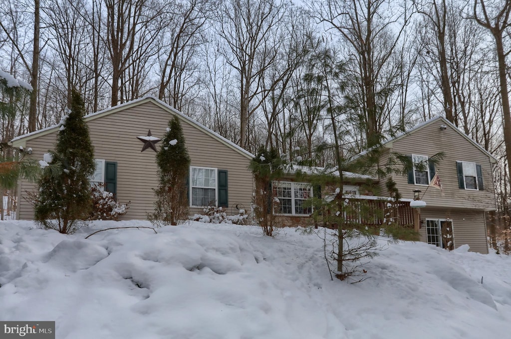 view of snow covered property