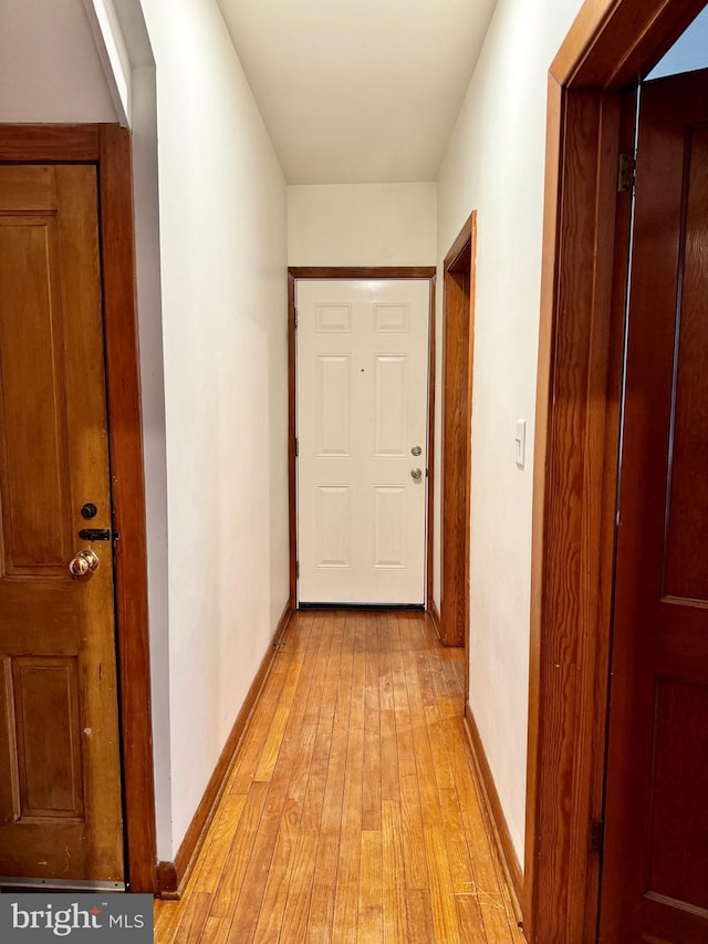 corridor featuring light wood-type flooring