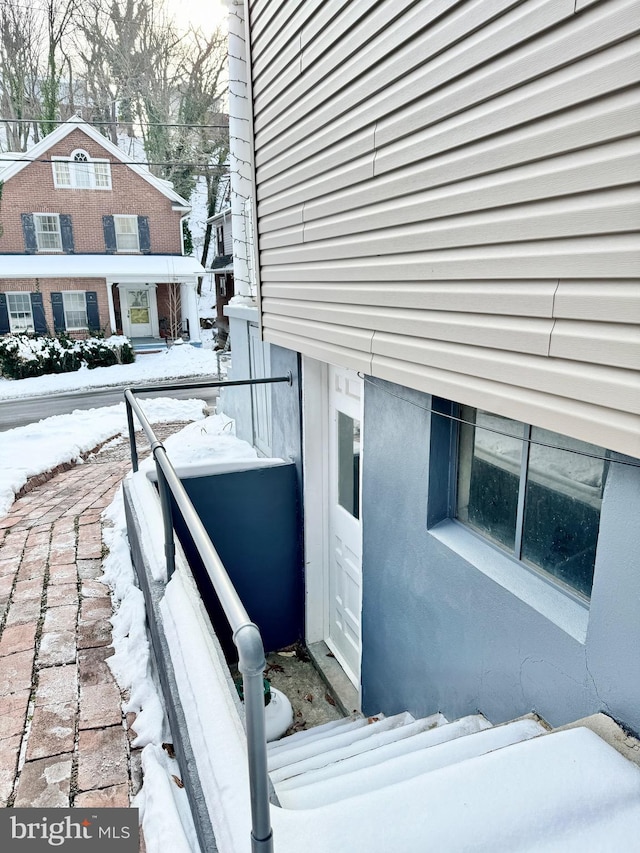 view of snow covered property