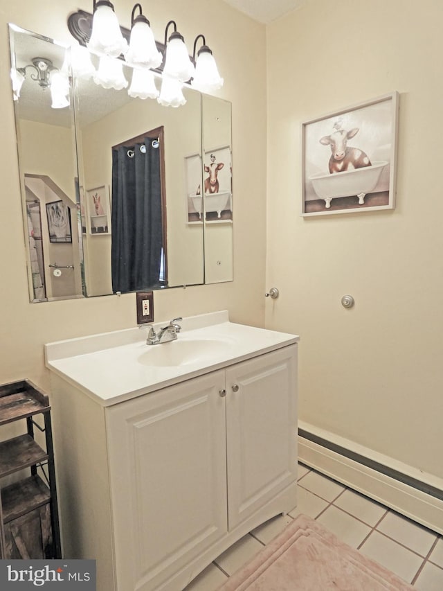 bathroom featuring vanity, a notable chandelier, and tile patterned flooring