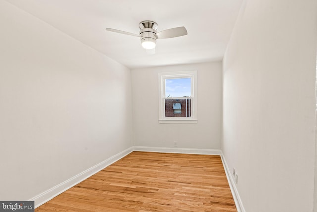 spare room featuring ceiling fan and light hardwood / wood-style flooring