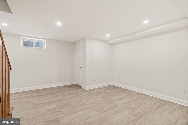 basement featuring light wood-type flooring