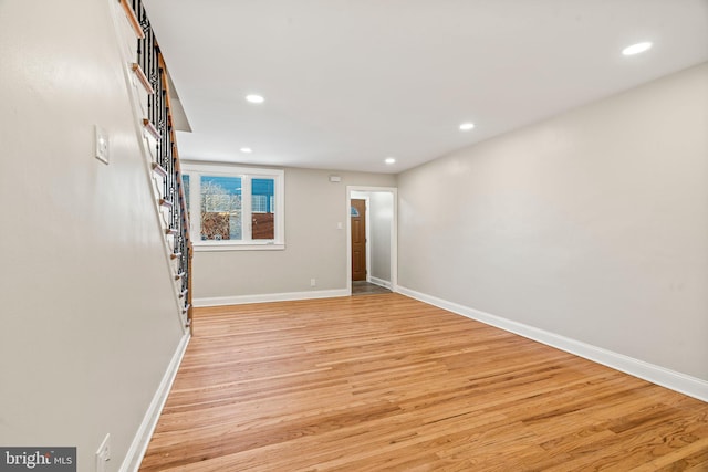 unfurnished living room with light hardwood / wood-style floors