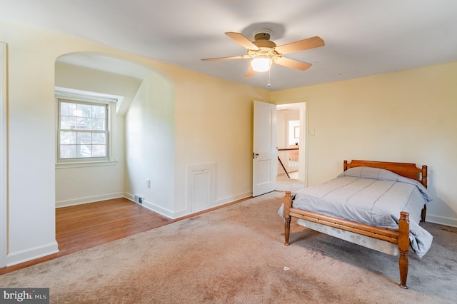 bedroom featuring light wood-type flooring and ceiling fan