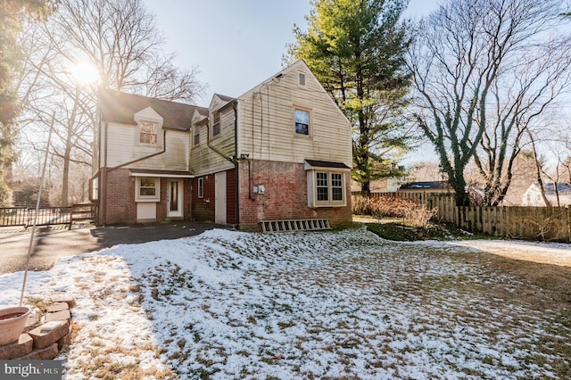 view of snow covered property