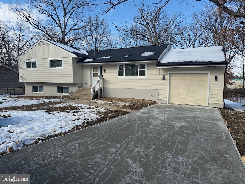 split level home featuring a garage