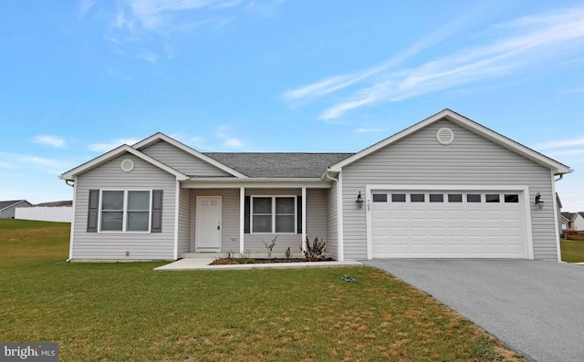 single story home featuring a front yard and a garage