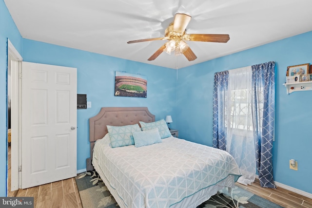 bedroom featuring ceiling fan