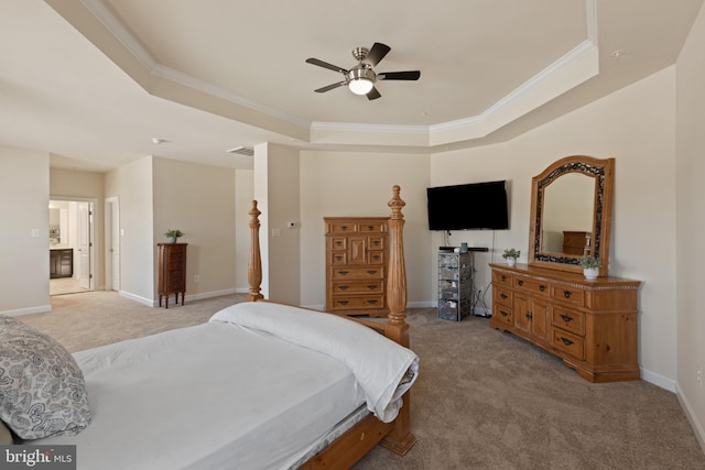 bedroom with ceiling fan, a raised ceiling, ornamental molding, and light carpet