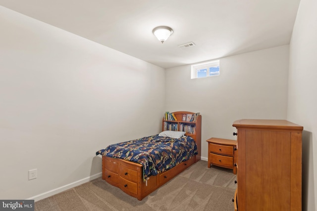 bedroom with light carpet