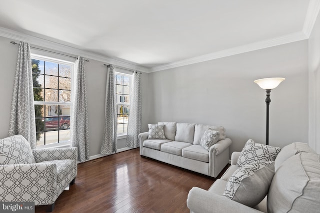 living room featuring dark wood-type flooring and ornamental molding