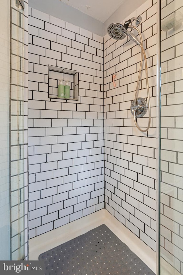 room details with a tile shower