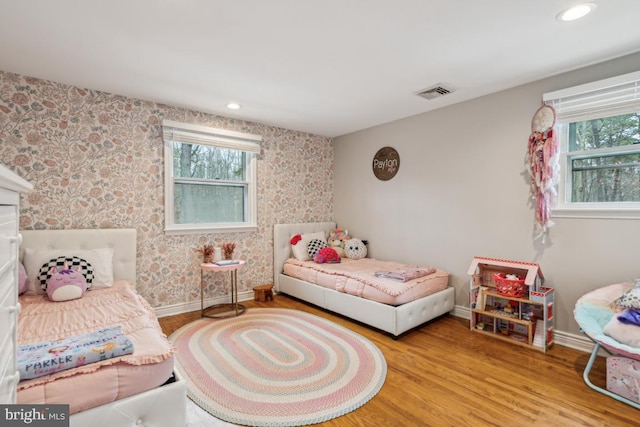 bedroom with light hardwood / wood-style floors